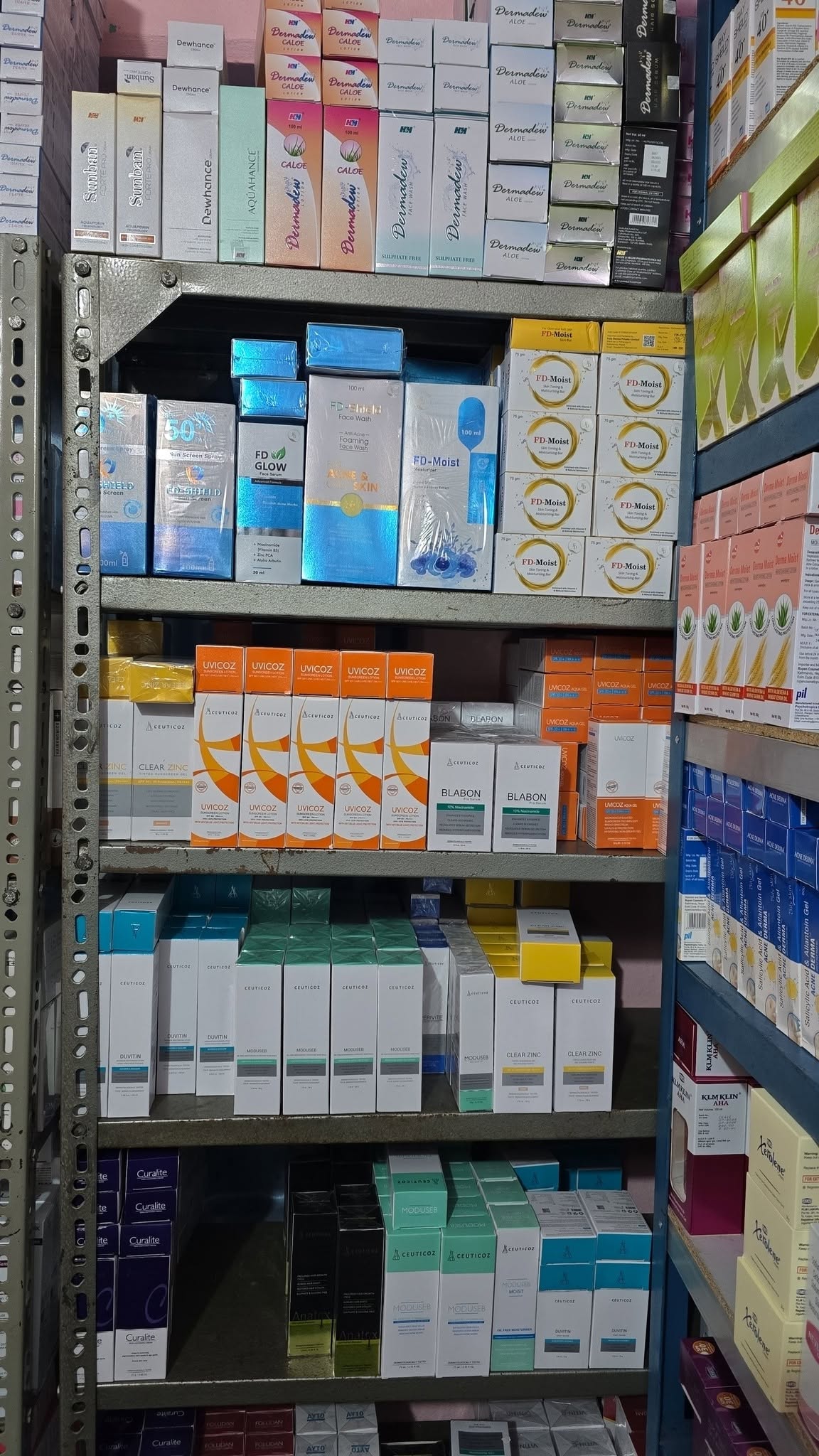 Shelves stocked with sunscreen, moisturiser and face wash products