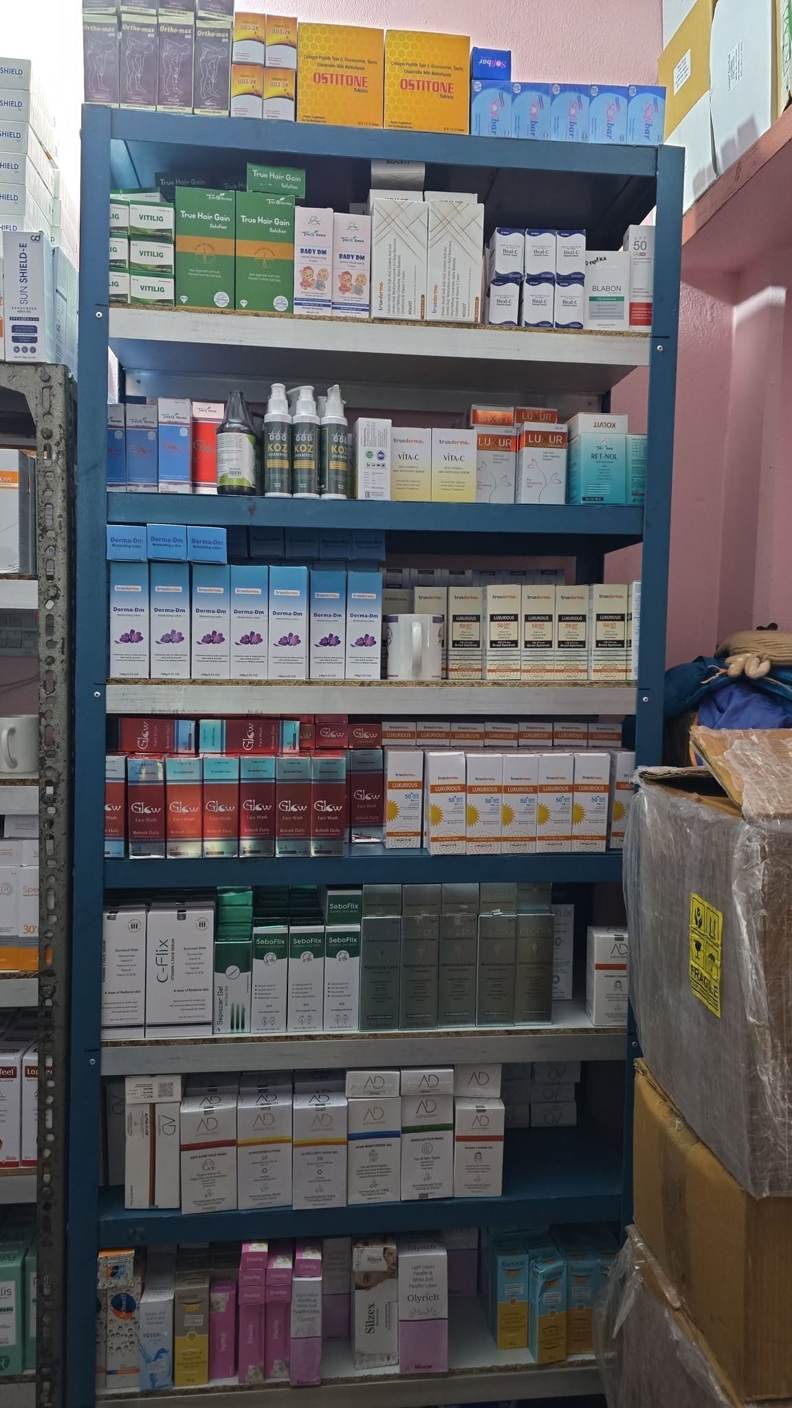 Shelves stocked with skincare and sun care products